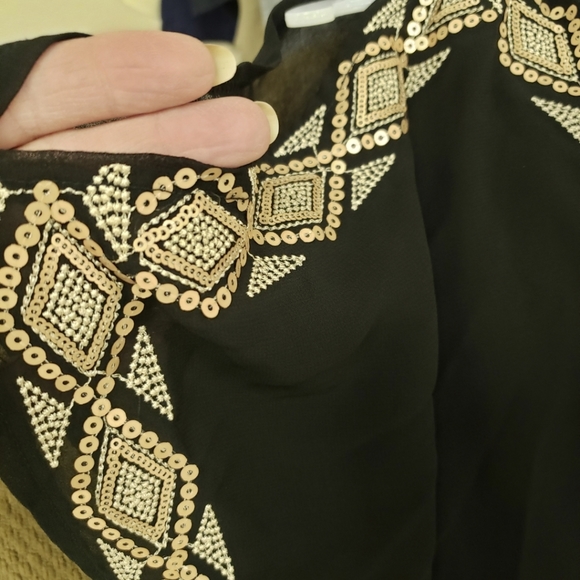 Beautiful black, short sleeve,sheer blouse with gold and silver sequined details - Picture 2 of 4